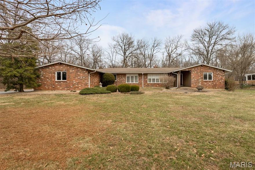 BACK ON MARKET----NO FAULT OF SELLER.....POTENTIAL BUYER PAID $10,000 TO RESERVE THE RIGHT TO PURCHASE FOR 30 days at listing price...and decided it was too small to serve their design....Exceptional Opportunity to Own a home in WESTCHESTER ESTATES... HOME IS BEING SOLD "AS IS"...SELLER WILL NOT DO ANY REPAIRS... Note that an Occupancy Inspection is NOT required by the City of Creve Coeur. This Three Bedroom, three full bath all Brick Ranch has approximately 2900 sq feet of living area...Lower Level is partially finished with a wet bar, fireplace and full bath. There are Two fireplaces... gas in the Large Main floor Family room that leads to the picturesque back yard that backs to woods, and  a wood burning FP located in the Lower Level Recreation Room that has a wet bar, and full bathroom....It has an Eat-in Kitchen...ready for your updates...there is a First Floor Laundry with utility sink (washer & dryer included). Master Bedroom has en suite bathroom...the other two large bedrooms share a hall bathroom.  There is a formal dining room...that leads to the 17 x 13 sunken Living Room....This well-built all brick home is ready for you to add your personal updates...Zoned Heating & AC are provided by newer Two Bryant High Efficiency 3 Ton A/C units and Furnaces....also there is a newer 50 Gal high efficiency HW heater.    There is plenty of room to expand & create additional living area in the Lower Level...8 ft plus foundation...The over-sized Three Car garage (33x21) has plenty of storage.