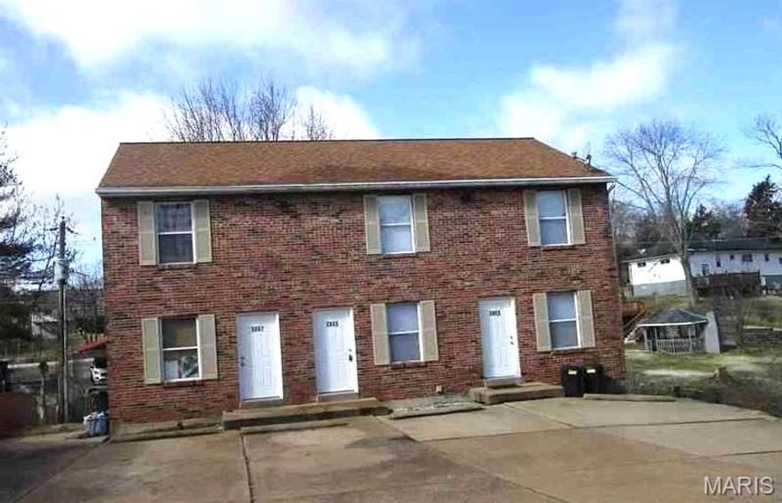 Welcome to this well-maintained townhouse located in the Fox c-6 school district. This spacious unit offers comfortable living with a functional layout and private basement space. The main level features a bright living room, convenient half bath, and an eat-in kitchen with ample cabinet space and great natural light. Upstairs, you’ll find two generously sized bedrooms and a full hall bath.  The unit includes a private full basement, offering plenty of storage space or room for hobbies, a workout area, or additional living flexibility. Washer/dryer hookups available.