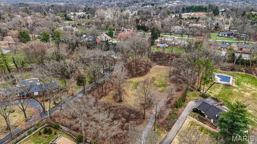 A rare opportunity to build a custom home on a pristine 1.82-acre homesite in the heart of Ladue. Tucked along a quiet cul-de-sac street, 68 Woodoaks Trail offers a private setting surrounded by established residences and mature trees. The rectangular lot has been cleared and is ready for construction, providing an exceptional canvas for a thoughtfully designed home. The property offers ample space to design a residence that takes full advantage of both indoor and outdoor living. Woodoaks Trail is known for its quiet residential character while remaining just minutes from the conveniences that make Ladue one of the region’s most sought-after communities. Located within the Ladue School District, including Conway Elementary School, this property offers the opportunity to design and build a custom home in one of the area’s most established and desirable communities.