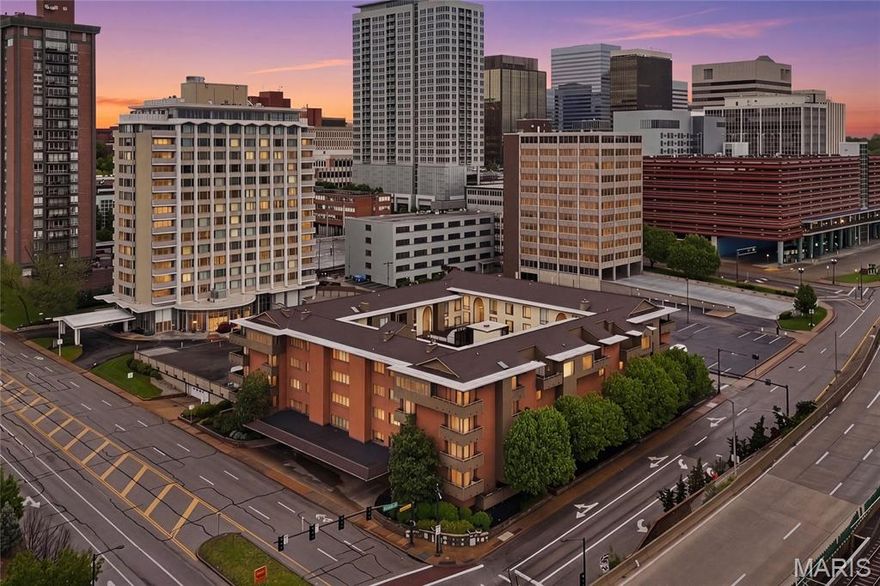 Elegant, renovated, and exceptionally spacious, this 2,082 sq ft first-floor condo at Shaw Park Place offers rare one-level living directly across from Shaw Park in the heart of Clayton. With a flexible floor plan, generous room sizes, multiple outdoor spaces, and a premier walkable location near downtown Clayton, this home delivers the space, convenience, and low-maintenance lifestyle today’s buyers want.

Fresh paint throughout, updated flooring, renovated bathrooms, and new appliances create a clean, move-in ready feel. The kitchen features granite countertops, ample cabinetry, pantry storage, and brand-new stainless steel range/oven/cooktop and over-the-range microwave. A full-size dining room, large living room, family room with wet bar, and dedicated flex room provide outstanding versatility for entertaining, working from home, hosting guests, yoga, exercise, or a quiet retreat.

The layout includes 2 bedrooms, 2 full baths, in-unit laundry with washer and dryer, crown molding in many rooms, and a beautifully renovated main bathroom with a walk-in glass shower. Three private exterior decks, including access from the kitchen and bedroom areas, extend the living space and offer views toward Shaw Park and the surrounding Clayton streetscape. Select interior rooms also overlook the landscaped atrium courtyard, adding natural light and a peaceful sense of setting.

Additional highlights include secured building access, elevator service, assigned covered garage parking, guest/off-street parking, private storage room, party/recreation room, and inviting courtyard gathering areas. Enjoy everyday convenience just moments from Shaw Park trails, tennis courts, pool, pickleball, playgrounds, Clayton Community Center, Meramec Elementary, Wydown Middle, Clayton High School, downtown Clayton restaurants, cafes, shops, galleries, MetroLink, I-170, I-64, Washington University, Forest Park, BJC, and Lambert Airport.

A standout opportunity for buyers seeking a spacious Clayton condo with outdoor living, garage parking, updated finishes, flexible living space, and an unbeatable location across from one of the area’s most loved parks.