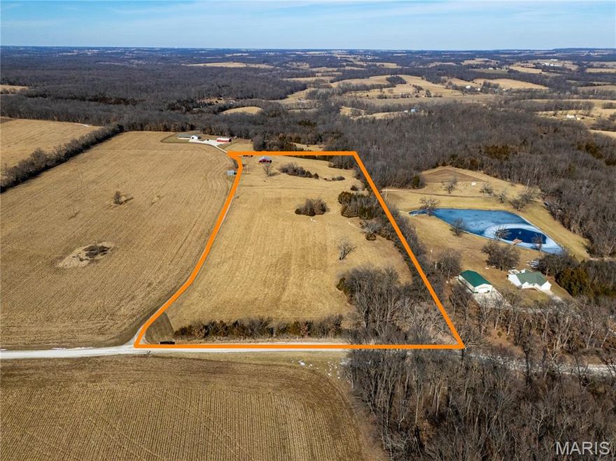 This great pasture lot with mature trees surrounding the perimeter is calling to be your new country home. Situated 20 min to Bowling Green or Eolia and an hour to Chesterfield, it’s an easy commute to your own private oasis. With only two parcels available (20± acres and 13± acres), there is no HOA and light restrictions are minimal, but enough to protect your investment. Electricity is already on site. There is a 40 x 40 barn kickstarting your homestead dreams as well as a smaller shed. This is great piece for someone wanting to build a nice custom home in need of some pasture ground for horses or homesteading.