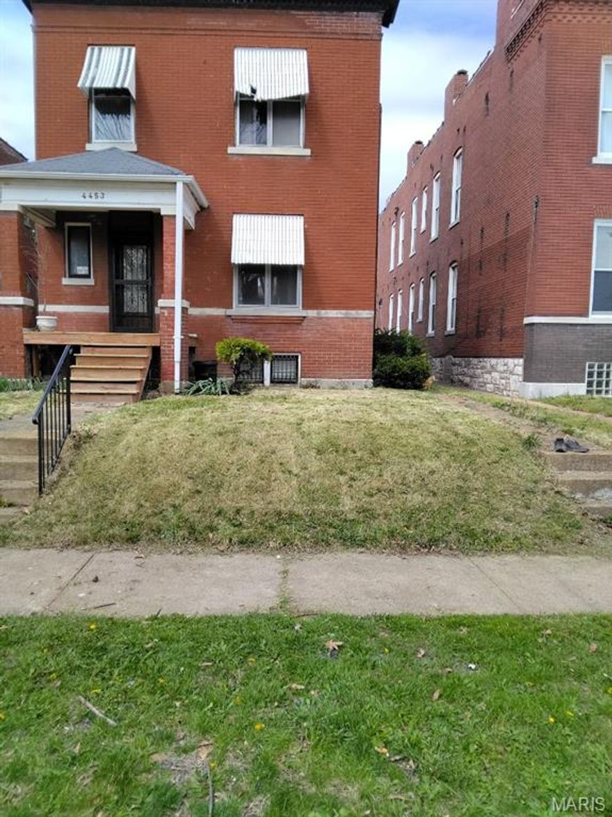 Three-bedroom, one-bathroom, two-story all-brick property full of character and renovation potential, ideal for investors or buyers seeking a standout restoration project. This home features a beautiful hardwood staircase, original built-in bookshelves, and pocket doors on the main level that highlight its timeless charm. Strong architectural details and solid construction provide an excellent foundation for renovation and added value.