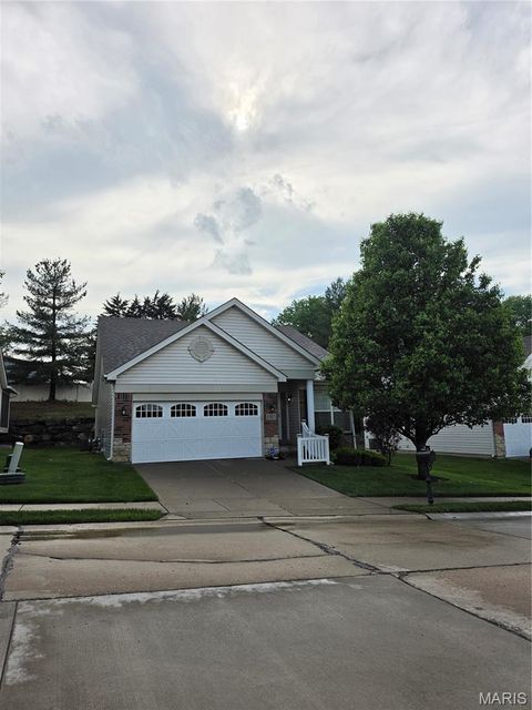 Photo of 1760 Waterfall Drive, St Charles, MO 63303 (MLS # 26023484)