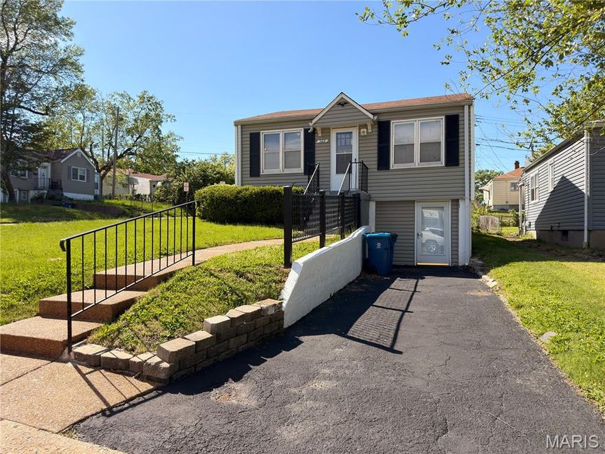 This 2-bedroom, 1-bathroom home sits on a nice, corner lot in a quiet, established neighborhood. The main level features a combination of hardwood floors and luxury laminate, and the interior has been updated with new appliances. The home is very clean and well-maintained throughout, making it an easy move-in for any buyer. The walk-out basement offers additional space that could work for storage, a hobby room, or casual entertaining. Off-street parking is available, and the low-maintenance exterior keeps upkeep manageable. Conveniently located within a reasonable distance of the airport, UMSL, and everyday amenities, this solid starter home would also make a great investment opportunity for those looking to add to their portfolio.