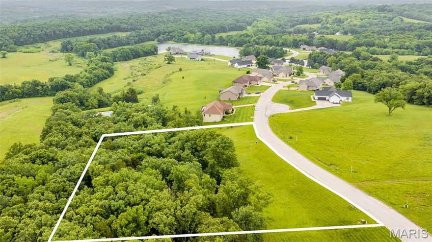 Welcome to a rare opportunity to own a slice of paradise nestled on a generous 2-acre lot, offering breathtaking views and unparalleled tranquility. Located in the prestigious Rainbow Lake Estates subdivision, this property promises an exceptional lifestyle with its combination of natural beauty, convenience, and luxury. Enjoy the convenience of public utilities, including water, sewer, electricity, and high-speed internet, already available on-site. This parcel also provides access to a 7 acre community lake allowing residents to indulge in a variety of water activities, from fishing to swimming and kayaking. If you are looking to have the benefits of a subdivision with the peace and quiet of the country, this is a must see lot!