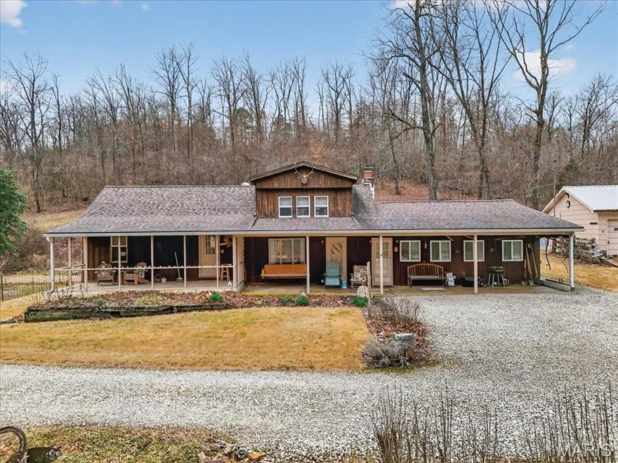 "Outdoor paradise, watch nature from your front porch.    Horse lovers dream, customize the barn to add stalls and tack and grooming space.  Horse trails on your own property!  The owner has enjoyed this private, peaceful, serene homestead for over 40 years and has bought another home out of state.  Unbelievable privacy, yet only minutes to St. Clair and 10 minutes to I-44.  Original parcel with 14 acres (see survey attached), and two additional parcels (2 acres and 4 acres).  Country kitchen with wood fired cook stove, open the back door and pick your own vegetables from your deer and varmint proof fenced garden.  Sit on the large back deck, or front porch and enjoy the peace.  Unrestricted 20 acres, close to town and highway I-44.  Make your move today and enjoy Spring, the absolute best time of year to wake up each morning at your new paradise.

Exterior buildings include 2 car garage, tractor shed, LARGE pole barn.