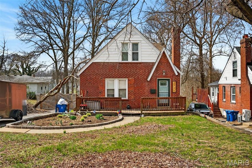 Solid brick home in the heart of Overland offering the perfect blend of updates and upside! The fully updated bathroom features a new vanity, tile floors, and tile surround, while the kitchen boasts newer cabinets and stainless steel appliances. The living room shines with hardwood floors, a new electric fireplace, and a stone mantle. Upstairs you'll find two good-sized bedrooms and a full second bathroom. The unfinished walkout basement is a blank canvas with serious potential — finish it out and add instant value. New kitchen flooring & updating the bathroom upstairs are the only things needed to bring this property to its full potential, making it a prime opportunity for the buyer looking to walk into equity. Don't miss this one!