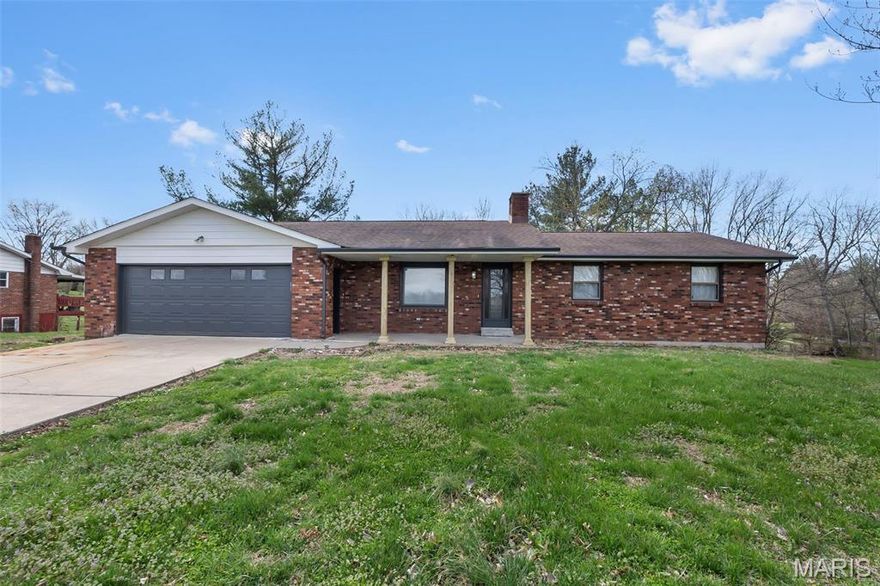 Welcome to 5569 State Highway 72 — a full brick ranch that checks all the boxes for its next owners! Situated just outside Jackson, this updated and remodeled home offers over 2,600 sq ft of living space, featuring 4 bedrooms and 3 baths total. Enjoy a spacious kitchen and dining area ideal for everyday living and entertaining. The walk-out basement provides additional living space with a cozy fireplace, plus a John Deere room with abundant storage. Step outside to relax on the covered back porch overlooking the chain-link fenced backyard. Additional highlights include an oversized garage, a beautiful tiled shower in the hall bath, and the convenience of country-style living just minutes from town. This well-maintained home offers space, updates, and functionality — schedule your showing today!