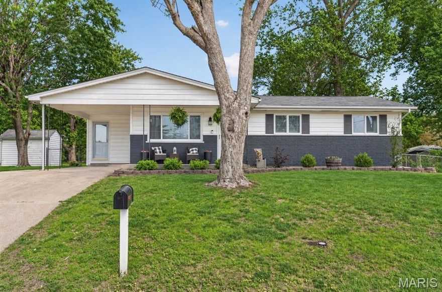 Welcome home to this charming ranch in the heart of Saint Charles. Enjoy an incredible outdoor setup featuring a large screened-in patio, covered porch and a level, fenced backyard—perfect for relaxing or entertaining. Inside, you’re greeted with hardwood floors and neutral paint in the spacious living room, complete with a large window. The kitchen features ample cabinetry, an electric range, and a window above the sink overlooking the backyard. The kitchen flows seamlessly into the breakfast room, which offers a built-in coffee bar, two pantry closets, and sliding glass doors leading to the screened-in patio. Retreat to the primary suite that offers its own private full bathroom, while two additional bedrooms and another full bath complete the main level. The finished basement provides ~600sqft of extra living space, along with a generous storage area and laundry. A one-car carport adds convenience. Ideally located near shopping, schools, grocery stores, and just minutes from I-70—making everyday living easy and accessible.