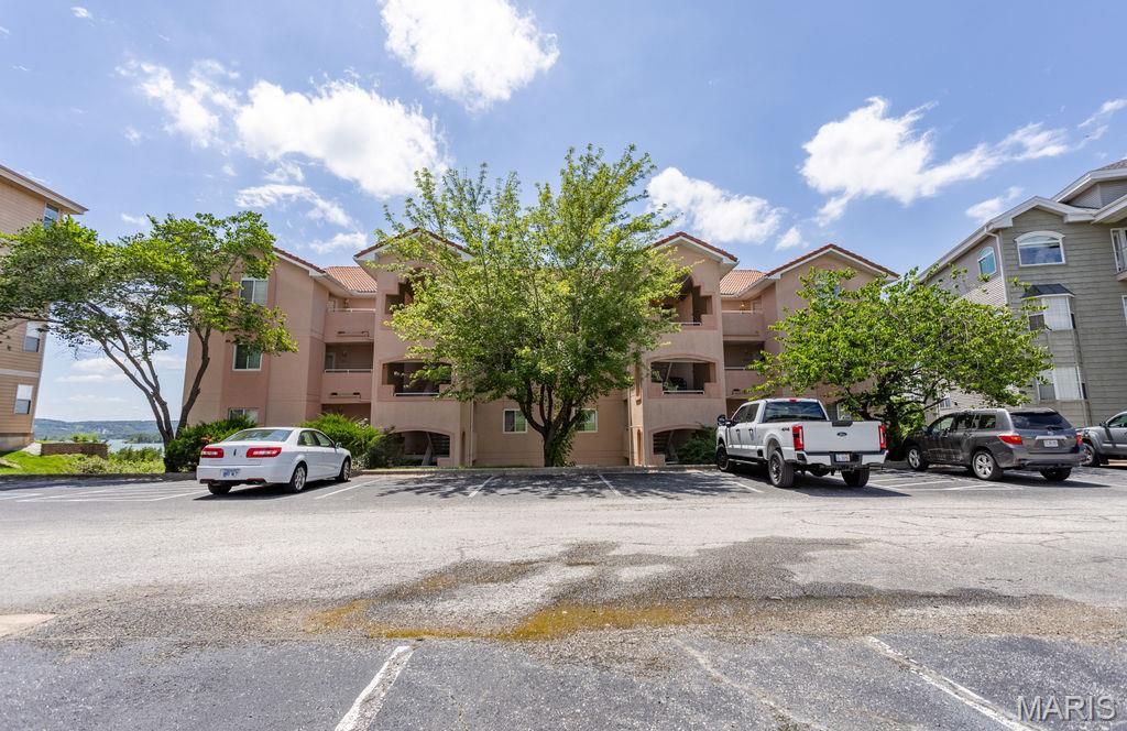 Photo of 700 Emerald Pointe Dr DR #101, Hollister, MO 65672 (MLS # 26037082)