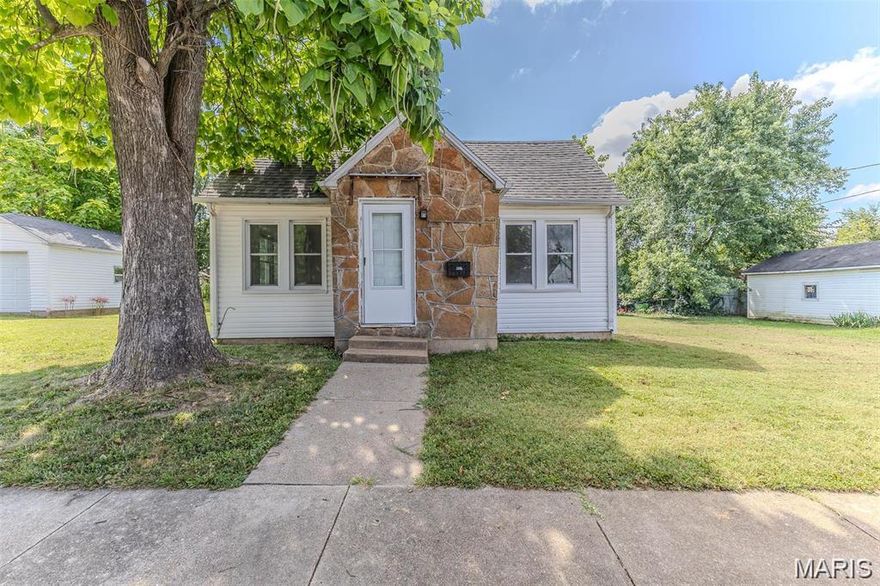 Welcome to this charming home full of character and warmth. From the moment you step inside, you’ll notice the beautiful hardwood floors that run through much of the home, adding timeless appeal and a warm, inviting feel. Architectural details such as the arched doorways give the space a unique touch of vintage charm while creating a natural flow between rooms. The home features generously sized bedrooms with plenty of natural light, offering comfortable and relaxing spaces to unwind. The main living areas feel open and welcoming, making them ideal for both everyday living and entertaining guests. One of the standout features of the home is the large laundry room, providing an abundance of space for appliances, folding areas, and additional storage — a rare and practical bonus that makes day-to-day living easier. Outside, you’ll find a detached garage that offers excellent space for parking, storage, hobbies, or a workshop. The yard provides room to enjoy the outdoors, garden, or simply relax and take in the surroundings. The home also features a **new roof installed in 2024**, giving added peace of mind for years to come. With its combination of character, functional layout, and charming details throughout, this home offers a wonderful opportunity for its next owner to enjoy both comfort and personality in a space that truly feels like home.