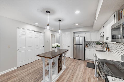 Tiny photo for 15026 Baxter Village Drive #E, Chesterfield, MO 63017 (MLS # 26051032)
