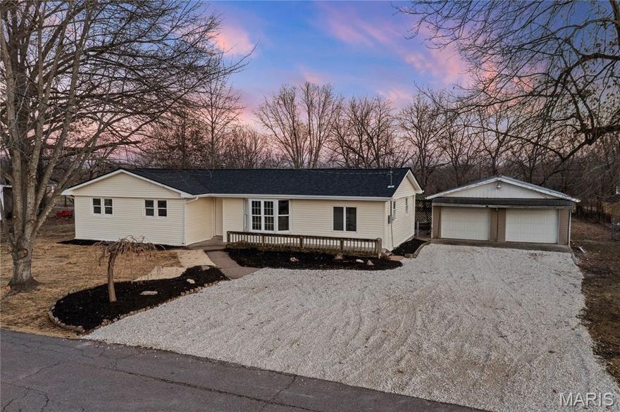 We are now active! Don't miss this renovated 4 beds, 2 baths home in Holts Summit. Large .60+ acre fenced lot, garden shed and detached 2 car garage. The living room is large and light filled. Split bedroom floorplan, some brick exterior. Be sure to see this in person!