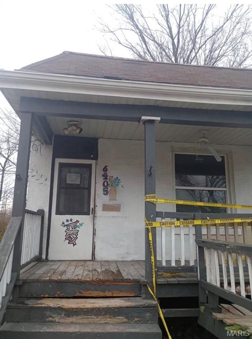 Brick bungalow with two bedrooms, one bath and a bull basement with lots of storage. Front has covered porch and back of house has a small deck. Easy to show, set your appointment today!