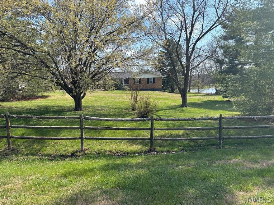OPEN SATURDAY, APRIL 4TH  1:00 - 4:00   Private Ranch Retreat on Nearly 1 Acre with Scenic Water Views 

Just minutes from Pacific, this beautifully maintained 3-bedroom, 2-bath ranch home on nearly one acre offers a rare combination of space, privacy, and convenience. Nestled on a generous corner lot surrounded by mature trees and thoughtful landscaping, this property feels like a peaceful retreat while still being close to shopping, dining, and the highly regarded Meramec Valley R-III School District.

Step inside to discover a light-filled open floor plan designed for both everyday comfort and effortless entertaining. A formal dining space flows seamlessly into the welcoming family room, where a cozy wood-burning fireplace creates the perfect gathering place for relaxing evenings or hosting friends and family.

The bright and functional kitchen features warm wood cabinetry, generous counter space, pantry storage, and a breakfast bar, along with stainless steel appliances including an electric range,  dishwasher (installation scheduled) and refrigerator.

One of the home’s most inviting features is the charming three-season sunroom, where you can enjoy morning coffee or unwind in the evenings while taking in peaceful water views and nature-filled surroundings. Just outside, the extended patio creates an ideal setting for outdoor dining, entertaining, or simply enjoying the changing seasons in your own backyard oasis.

The primary suite offers a comfortable private retreat with an adjoining bath and shower, while two additional bedrooms and a full hall bath provide flexibility for family, guests, or a home office.

The partially finished walk-out basement expands the living space with room for a recreation area, media room, or game lounge, along with a dedicated laundry area and abundant storage.

Additional highlights include:

• Full brick exterior for timeless durability

• Oversized two-car side-entry garage

• Extended aggregate driveway and walkway

• Storage shed included

• Nearly one acre corner lot offering privacy and space

Homes offering this much land, privacy, and scenic surroundings rarely become available this close to Pacific, making this a unique opportunity for buyers seeking a peaceful lifestyle with modern convenience.

You won't want to miss this GEM! Schedule your showing appointment today!