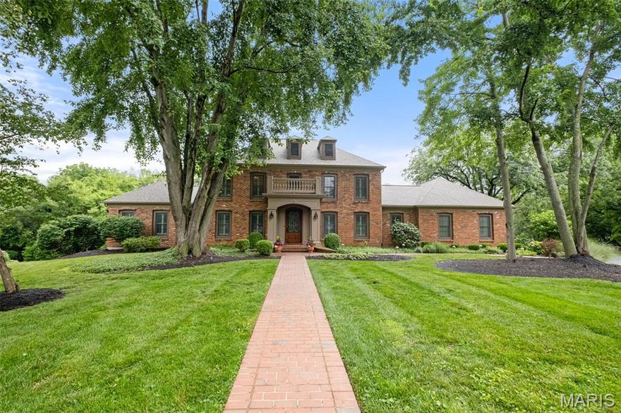 Located within the prestigious enclave of Arlington Oaks, this gorgeous home showcases captivating views, mature trees, and a backyard retreat that feels like your own private resort. The beautifully designed pool, paired with lush landscaping and expansive green space, creates a true oasis.

Step into the grand foyer with soaring ceilings and an immediate sense of timeless elegance. Detailed dental crown molding runs throughout the main living spaces, providing a refined finish that reflects the home’s quality craftsmanship.

The spacious kitchen boasts granite counters, a Sub-Zero refrigerator, Wolf appliances, center island, and tranquil views of the backyard. The great room offers floor-to-ceiling windows, a wet bar, and exterior access to a sweeping deck.

The main level primary suite offers a refined retreat with an updated bathroom featuring porcelain tile, heated floors, a spa-inspired walk-in shower, and a separate soaking tub. 

Upstairs offers three additional bedrooms and a beautifully updated full bath. The finished walkout lower level adds expansive living space, plus a full bath convenient for guests enjoying the pool.

Walking distance to Longview Park and beautiful neighborhood trails. A rare opportunity to own a luxury home with both elegance and legacy on a premier, tree-lined lot.