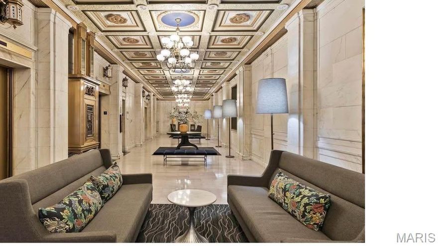 Enjoy downtown living in this 2-bedroom, 1-bath condo in the historic Marquette building in the heart of St. Louis. This bright unit features an open layout, large windows, and the convenience of an in-unit washer and dryer. Residents have access to excellent building amenities including a rooftop terrace with stunning city views and a community pool. Located just steps from Busch Stadium, the Gateway Arch, restaurants, and downtown entertainment, this condo offers the perfect combination of comfort and convenience. Low-maintenance urban living in one of downtown’s most iconic buildings!