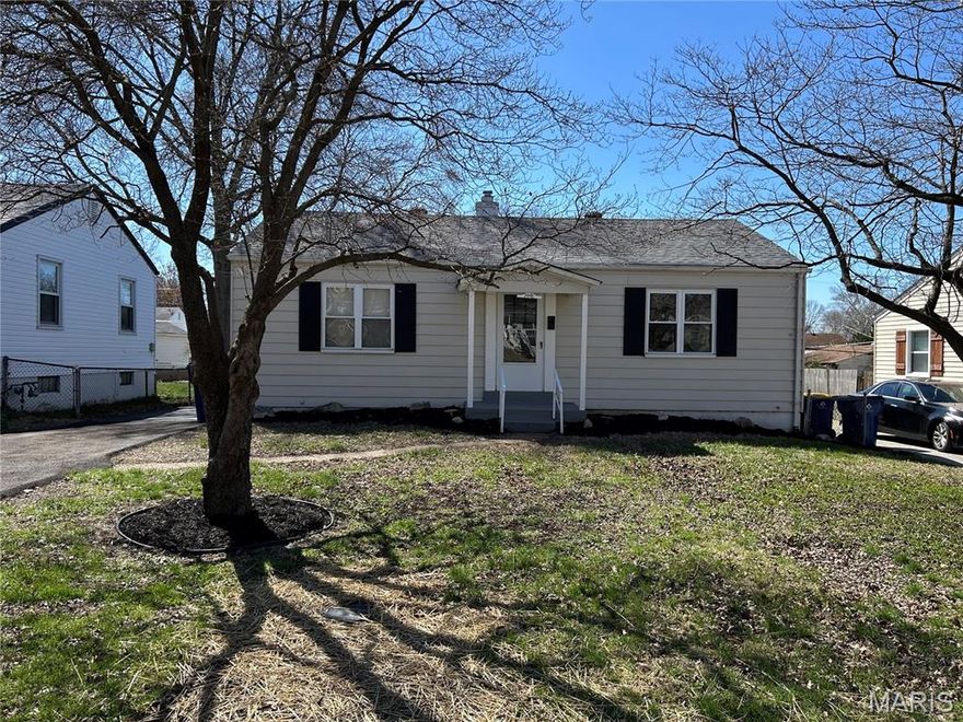 *Back on the Market due to no fault of Seller*Move in Ready with Great Curb Appeal! This 2 bedroom, 1 bath home has refinished hardwood floors in the living room, dining room and bedrooms. Newly installed vinyl waterproof wood like flooring in kitchen, hall and bathroom. New stove and refrigerator. Fresh paint throughout including the lower level which is partially finished into 3 separate rooms just waiting for your finishing touches. New roof, new sewer lateral in basement from stack to exterior with exterior sewer lateral replaced by Woodson Terrace. New asphalt driveway (approximately 40 ft) to outdoor storage shed /small garage for compact in the backyard. Beautiful yard with plenty of room for activities or future garden area. Quick access to highway and local shops.