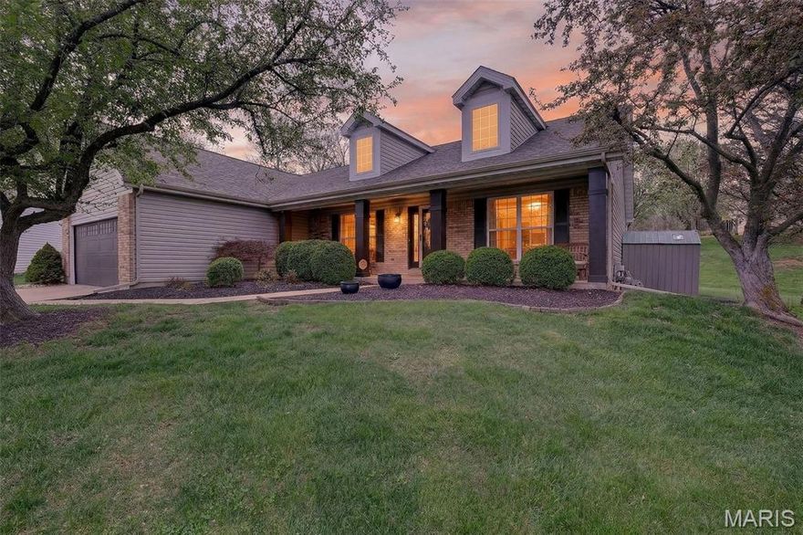 Showings begin 4/9, with an open house on 4/11 from 11 to 1. Welcome to easy main floor living in this stunning ranch with incredible curb appeal, featuring charming dormers, new siding, a new roof, and a new garage door, all tucked away on a quiet cul de sac with a park like backyard in a peaceful pocket of O’Fallon. Step inside to an expansive living area with a formal dining space (currently used as a den) and a great room with vaulted ceilings, a bay window, built in shelving, and a cozy fireplace, all flowing seamlessly into an open concept kitchen with soaring vaulted ceilings. Luxury bamboo flooring adds a sense of peace and zen throughout the home, while maple colored cabinets in the kitchen and bathrooms further enhance the warm, calming feel. The desirable split bedroom floor plan includes a spacious primary suite with vaulted ceilings, a bay window, a beautifully remodeled ensuite bath with a luxury glass shower, and a massive walk in closet, while two additional bedrooms are generously sized and share a well appointed hall bathroom. Enjoy the convenience of main floor laundry and an oversized two car garage, plus a mostly unfinished basement offering a fantastic opportunity to create additional living space. And just wait until you see the park like backyard, sitting on over 1/3 of an acre and complete with an irrigation system. Located within the highly desirable Fort Zumwalt North School District, within walking distance to Alligator’s Creek Aquatic Center, and offering quick access to I-70 in under five minutes, this home is an unbeatable value in one of O’Fallon’s most desirable areas.