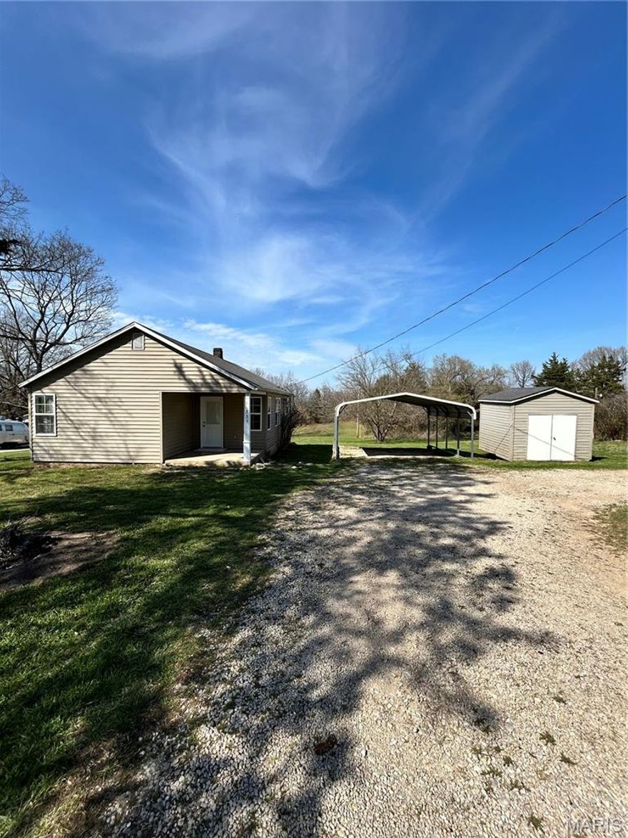 Modern living meets cozy comfort with this 2 bed 1 bath in the heart of Bourbon. Perfect starter home or investment opportunity with warm wood tones and a ton of charm. This property has updated Vinyl plank flooring and modern bathroom. Don't miss the large back yard perfect for entertaining, spacious carport and shed. Schedule your showings today!