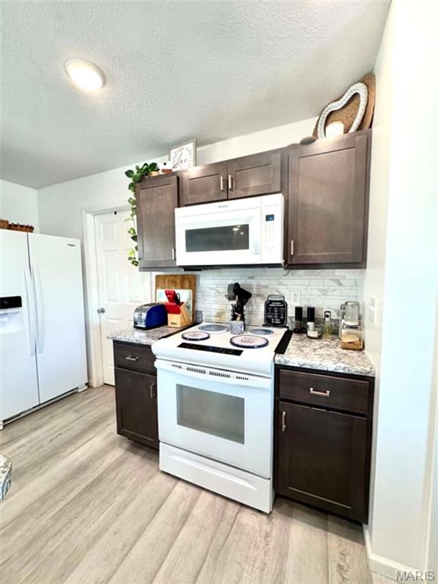 Welcome home to this beautiful 3-bedroom, 2-bath residence built in 2021 by Habitat for Humanity. Designed with comfort and convenience in mind, this home features an inviting open-concept floor plan that seamlessly connects the living, dining, and kitchen areas, creating the perfect space for everyday living and entertaining.

Enjoy the ease of main-level living with all essential rooms conveniently located on one floor. The thoughtfully designed layout offers spacious bedrooms, modern finishes, and plenty of natural light throughout.

Located in the highly sought-after Mark Twain School District, this home provides the perfect blend of small-town charm and modern living. Whether you're a first-time homebuyer, downsizing, or simply looking for a newer home with low-maintenance living, this property is one you won't want to miss!

Schedule your private showing today and discover all this move-in-ready home has to offer.