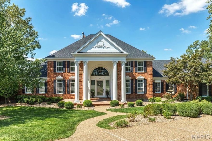 Spectacular 1.5-sty Georgian Colonial in prestigious Whitmoor Country Club. Grand 2-sty foyer highlighted by dramatic curved staircase leads to library-paneled study, elegant dining room and coffered great room with marble fireplace, built-in bookcases & soaring windows that overlook the lake & North course. Chef’s kitchen with cherry cabinetry, granite countertops, stainless steel appliances & convenient planning center adjoins light-filled breakfast room with adjacent wet bar & vaulted hearth room with floor-to-ceiling brick fireplace. Sumptuous master bedroom suite provides an appealing retreat with His & Hers walk-in closets, wide bay window with French doors to deck & beautifully appointed bath. Front & rear staircases access 3 additional bedrooms, 1 with ensuite bath & 2 with Jack n’ Jill bath. Walk-out Lower Level includes recreation room with fireplace, game room & gathering bar plus guest suite & full bath. Situated on a private cul-de-sac lot with tiered decks & 3-car garage.