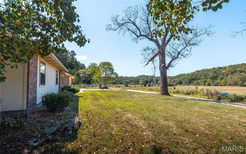 Tiny photo for 10110 Ashley Creek road, Unincorporated, MO 65560 (MLS # 26012958)