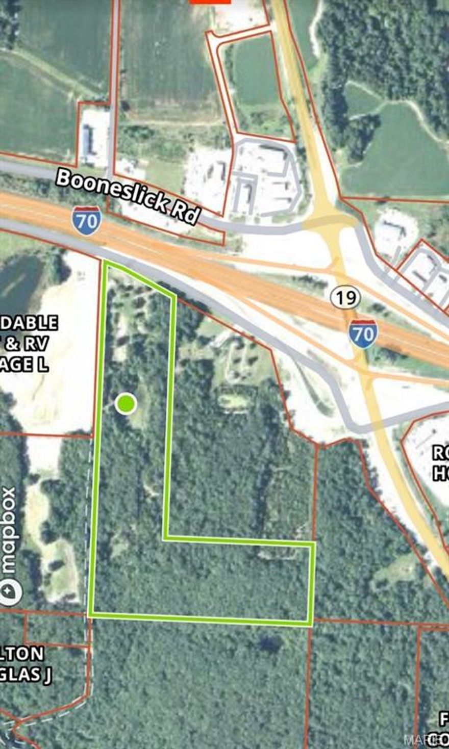 The Possibilities are endless!!! 32.21ac. Less than a 1/4 mile from the new overpass in New Florence. The Property lays Level to rolling with a mix of open and wooded ground.   Nice, stocked lake and smaller pond on the property.  Great Commercial potential with the new Mega-site coming. Property is within eyeshot of McDonalds and Fastlane across the highway. Get in on the ground floor of all the growth coming to New Florence while you still can.