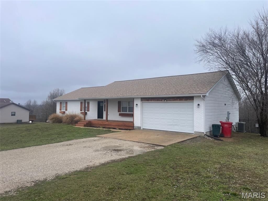 Photo of 24570 Spencer Road, Waynesville, MO 65583 (MLS # 26012761)