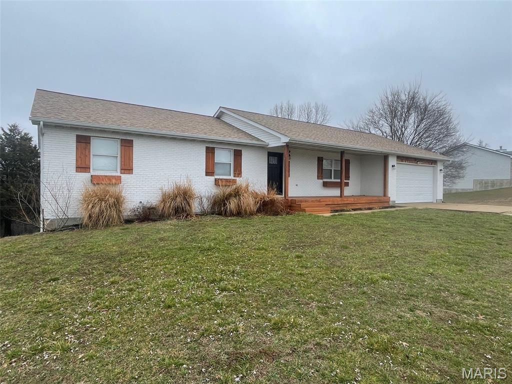 Photo of 24570 Spencer Road, Waynesville, MO 65583 (MLS # 26012761)