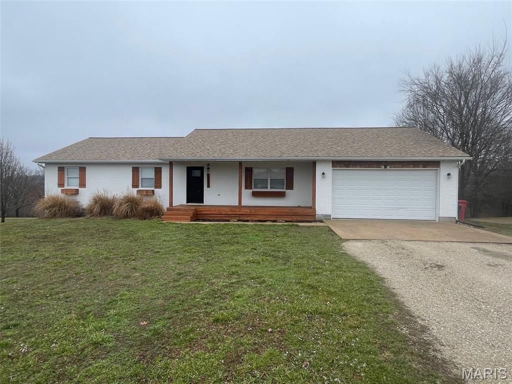 Photo of 24570 Spencer Road, Waynesville, MO 65583 (MLS # 26012761)