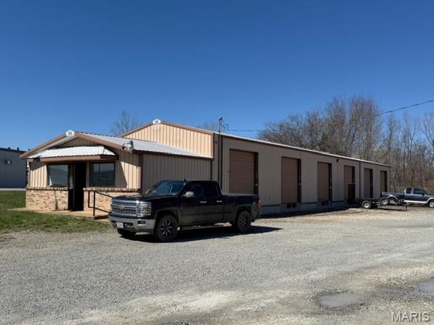 3,450 SF commercial building, featuring a 400 SF office area with a restroom. Nestled in an excellent industrial park location, the property boasts six convenient overhead doors in the warehouse, making it suitable for various uses. The adjacent storage building, also available for lease, provides additional flexibility for storage or operational needs.