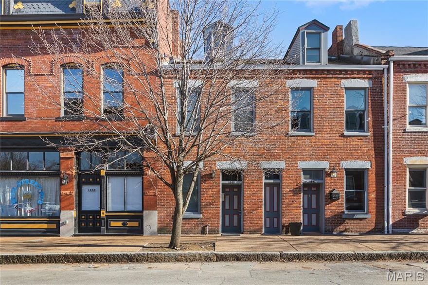 Outstanding Opportunity!!! This fantastic Soulard Townhome boasts open floor plan with exposed brick walls and wood floors. Main floor features an open living/dining combo with exposed brick, granite counters and half bath! The covered wood deck off the kitchen and a privacy fenced back yard great for entertaining and barbecues.  And Shhhh.... here's the secret... There's an extra section of the L-shaped lot that's perfect for OFF-STREET PARKING for your car AND YOUR GOLF CART! The second level features of two bedrooms and a full bath with 3rd bedroom up top! The rear bedroom opens to a balcony with great city views! Recent exterior upgrades, updated electric, and newer HVAC make this one a WINNER!  Grab a pint a few doors down or some tacos at the end of the block!  It doesn't get much better than that!