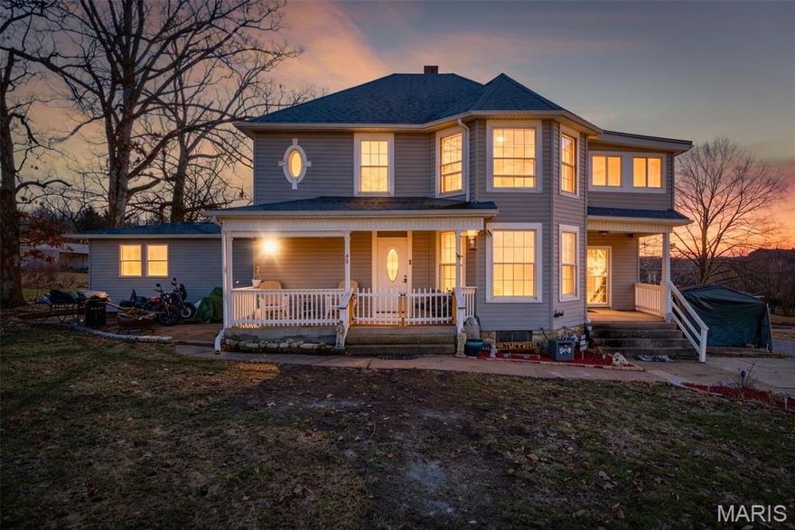 Step back in time with this beautifully preserved 1910 historic home, nestled in a private, close-knit neighborhood rich with charm and character. Situated on a spacious one-acre lot surrounded by mature trees, this property offers both privacy and timeless appeal.

Inside, you’ll find original hardwood floors, crown molding, and a working pocket door that showcases the home’s craftsmanship. The main-floor primary bedroom features a handicap-accessible shower in the master bath for added convenience. Additional highlights include an office or hobby room, main-floor laundry, and a sunroom on the second floor that provides a bright, relaxing retreat.

Modern updates blend seamlessly with historic details—two new HVAC systems (installed 12 months ago), roof and windows less than 10 years old, and new deck, front, and side doors replaced just 2 years ago. The walk-out basement offers ample storage and includes a sump pump.

Appliances include a range and dishwasher only one year old. Owners note that the original hardwood floors are in need of some love, offering an opportunity to restore their timeless beauty.

This rare gem combines historic charm with modern comfort—perfect for those who appreciate character, space, and community.