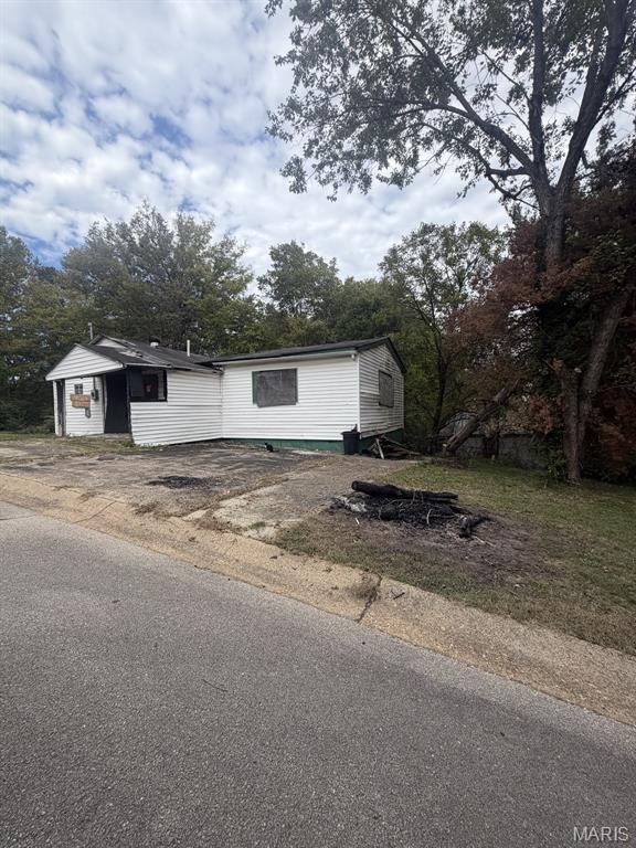 Photo of 609 Flint Street, Poplar Bluff, MO 63901 (MLS # 26067948)