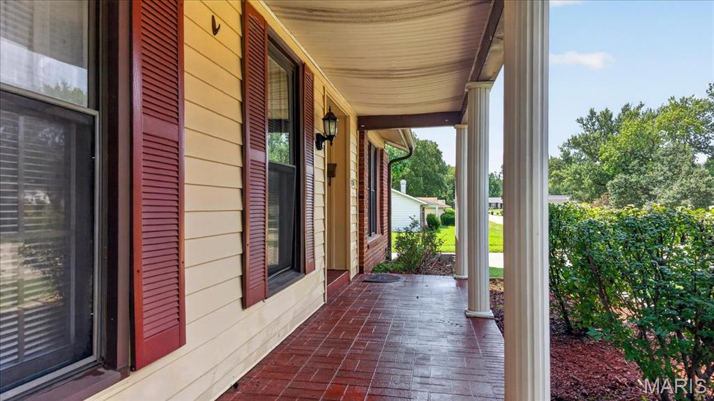 Photo of 3608 Whispering Woods Drive, Florissant, MO 63031 (MLS # 26051821)