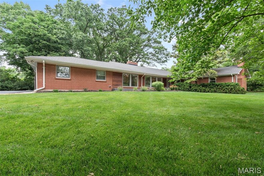 Situated in the heart of Frontenac on a private acre,  this updated 4 bed, 4.5 bath sprawling ranch home offers the perfect blend of modern convenience and tranquil living.  Find light filled spaces including a formal liv rm, din rm and main floor family room that overlooks the patio and backyard. The current sellers have updated kitchen with beautiful cabinetry, gorgeous center island, stainless appliances and quartz countertops.  The mudrm/laundry rm with new cubbies adjoins a full updated bath, perfect for access from the backyard. 2 large bedrms share an updated hall bath and the 4 bedrm is a private suite with updated bath.  The primary suite is extra large with fireplace, walkin closet, updated bath and private office.  The finished low lev provides a versatile space that can be used as a family room, entertainment area.  Find another private office and updated half bath as well.  Close to Ladue and private schools.  New sprinkler system, professional landscaping and much more.