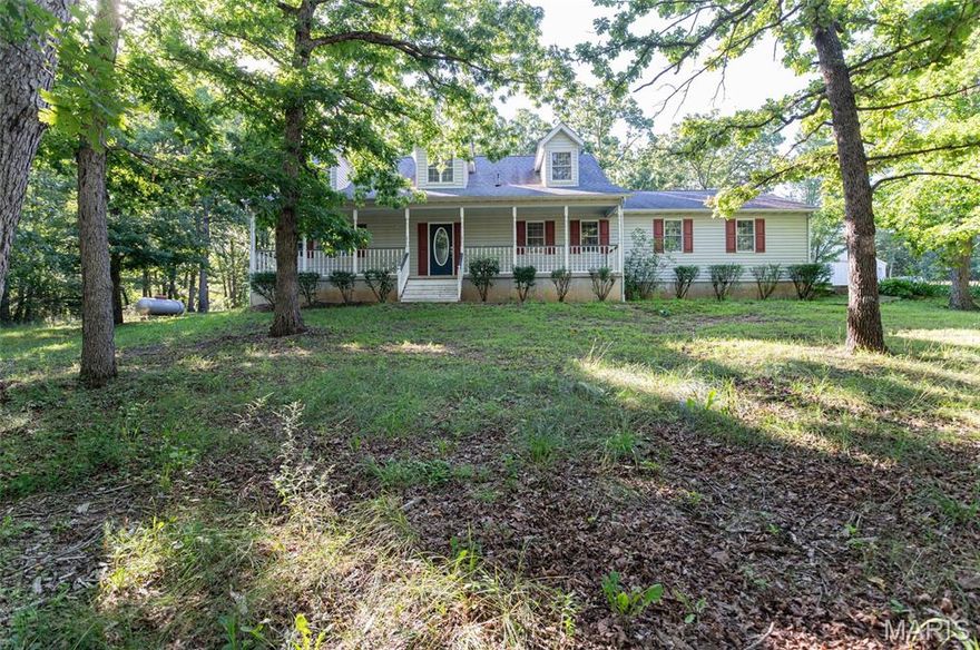 Spacious 5-bedroom, 4.5-bath home on ~3 scenic acres just minutes from town! Enjoy the perfect blend of privacy and convenience with over2600 sq ft of living space, abundant natural light, and exceptional storage throughout. The open-concept layout includes generous living areas, cozy wood burning stove in living room for those cold winter nights, a well-appointed kitchen, and a main-level primary suite and laundry. Additional garage with attic for lots of storage and attached work shop for the man who needs his space! While there is no basement this home features a dedicated storm shelter for those severe weather days. A rare opportunity to own a beautiful home with acreage in a quite neighborhood just minutes from town!