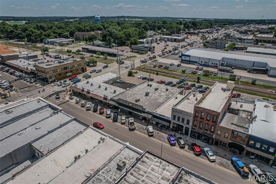 Take advantage of this turnkey investment opportunity located on highly visible Commercial Street in the heart of historic downtown Lebanon. This impressive 7,500 sq ft, 3-unit commercial building offers excellent visibility, foot traffic, and long-term potential in the city's most vibrant business district. Each unit features large storefront windows and flexible interior layouts—perfect for retail, office, or service-based businesses. All three units are currently leased, generating immediate income for the new owner. The building sits just steps away from local shops, restaurants, and community events, making this a sought-after location for both tenants and customers alike. Whether you're looking to expand your portfolio or secure a solid income-producing property, this is a rare chance to own a fully leased commercial asset in a growing downtown market.
