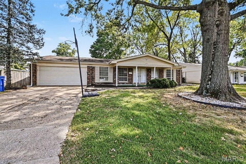 Photo of 670 Brookstone Drive, Florissant, MO 63033 (MLS # 26059261)