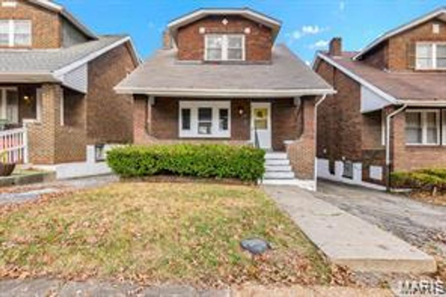 Need help with Closing Costs??   This seller is motivated.  This could be your lucky day!!  Talk with your agent.  Come and enjoy  an affordable, very nicely kept and updated home in U City.  3 spacious bedrooms on second floor and 1.5 baths.  Plenty of space on the large front porch.  Basement is partially finished that has a direct walkout to the rear entry garage. Large first floor with gas fireplace, separate living room and dining room and nice kitchen updates. Updated laminate flooring on first floor. Nice flat , fenced yard.   Roof, ac, furnace  and water heater,  over 25k in upgrades, are all newer in the last 1-2 years.  All appliances , washer and dryer included in the sale. Close to Heman Park, only 2 blocks from schools, easy access to Olive.