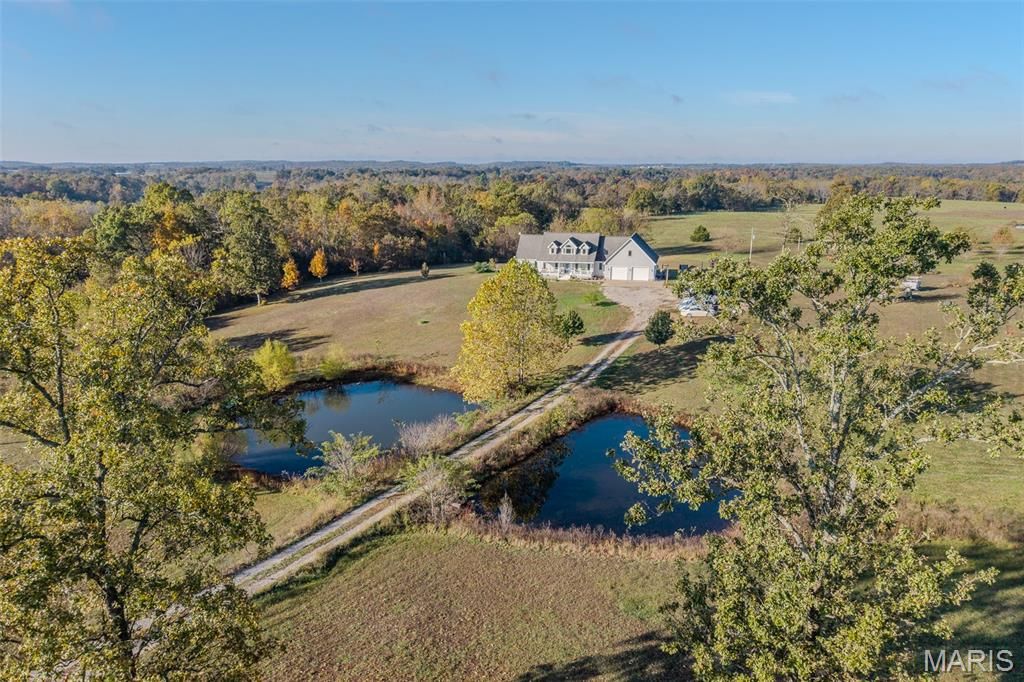 Photo of 271 Pleasant Knoll Road, Stoutland, MO 65567 (MLS # 26027460)