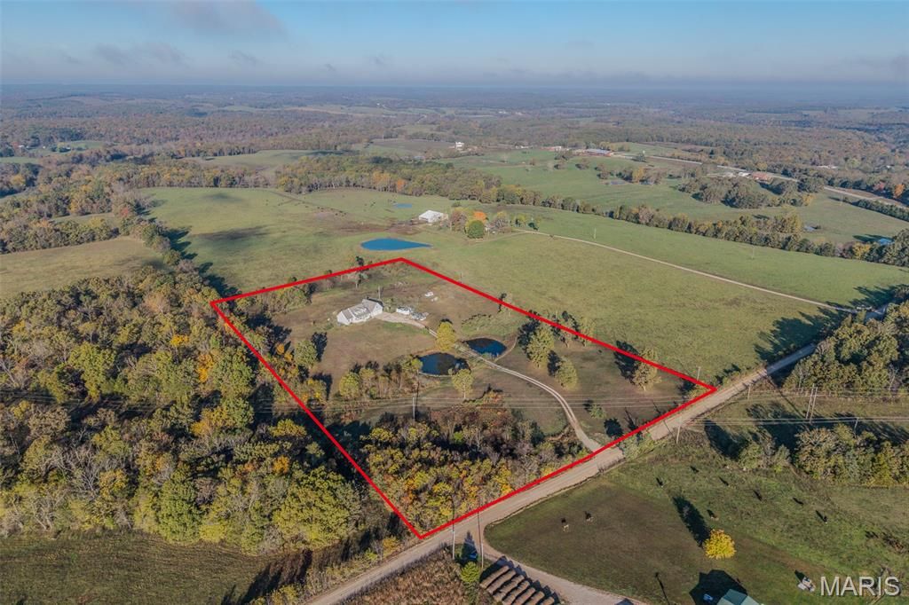Photo of 271 Pleasant Knoll Road, Stoutland, MO 65567 (MLS # 26027460)