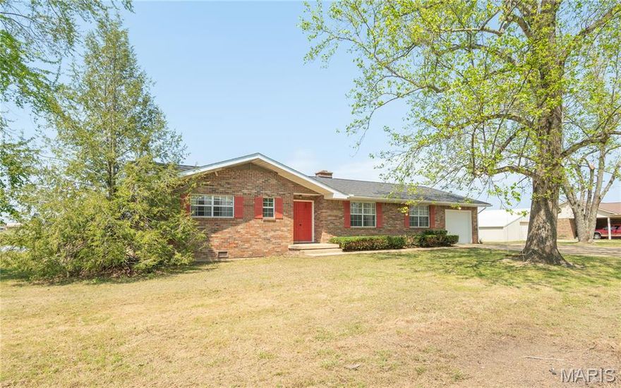 Welcome to this stunning recently remodeled home located in the highly sought-after area of Ripley County. This 3-bedroom, 2-bathroom property sits on over half an acre of land and is just minutes away from Doniphan and the Current River. The all-brick house boasts a spacious open floorplan with beautiful shiplap accents throughout. Step outside to the front yard and be greeted by a shaded, meticulously landscaped oasis that will leave you in awe. Unwind and enjoy the serene surroundings on the sunroom or back deck after a long day. Don't miss out on the opportunity to view this amazing property - call today to schedule a showing and prepare to be enchanted by all it has to offer!