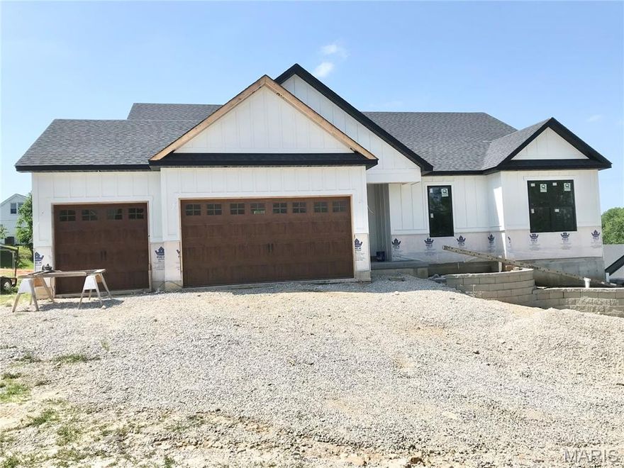 Gorgeous Ranch home being built in Wellington Place Subdivision, only minutes from shopping, Restaurants and Major Highways. This is not your usual cookie cutter subdivision. Smaller Subdivision with different styles of homes make this a must see. Check out this new 3-bedroom, 2.5-bath Ranch home that is loaded with options. Oversized 3 car garage, walk-out basement, 12 ft. ceilings in the Great room, Breakfast area and Kitchen, 9 ft ceilings through-out the rest of home, Window wall in Great room, huge island in Kitchen, granite counter-top, stainless appliances, built-in microwave, open staircase with wrought iron spindles and a custom walk-in shower in the primary bathroom.  Pictures are of previously sold homes- options may vary.
