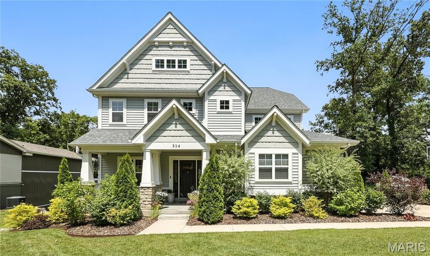 Exceptional custom build—just 4 years new & located in Kirkwood School District. Over 4,000 sqft of living space nestled on 1/3 of an acre, it’s designed with luxury finishes and craftsmanship throughout. Wide-plank engineered hardwood floors flow across the main level, complemented by 9-ft ceilings and rich millwork. The gourmet kitchen features 48” custom cabinetry, stacked crown molding with multiple profiles, quartz, a tile backsplash, & massive walk-in pantry. A large center island offers prep space & seating, perfect for entertaining. Stainless gas range/oven and a built in electric wall oven and microwave. The great room is anchored by a gas fireplace with shiplap and tile detail, flanked by substantial built-ins. A Pinterest-worthy planning room offers cabinetry, quartz counters, & beverage fridge. A stylish, functional mudroom with custom cubbies is a perfect drop zone. The sunlit office is the ideal work from home space without distractions of the main living area. Upstairs: a luxe primary suite with coffered ceiling, wood accent wall, spa-like ensuite & expansive walk in closet. 3 more bedrooms, a large hall bath, & laundry room with sink & storage complete the second floor. The walk-out lower level adds a 5th bedroom, rec room, full bath, & cozy kids reading nook. The yard is amazing with high end landscaping, maintenance free deck, spacious patio with sofa swing and... you'll love the fully finished 'she shed'--the perfect creative studio or home office hideaway!