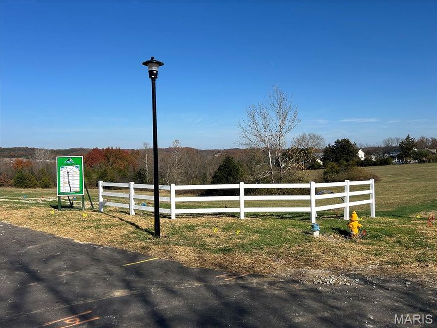 THE HIGHLANDS is  Franklin Counties Latest and Finest 1-3+ acre Custom Home  20  Lot Development . Truly an enclave with few neighbors.  You may choose from a variety of Open & Wooded lots all with  mostly level building sites and gently sloping rear yards, perfect for rear walk out some overlooking common ground, lake, and or woods.  Enjoy a Country atmosphere with ALL underground city services ,Sewer, water, telephone, Electric, Spectrum Internet, Spire Natural gas ,Incredible endless Hilltop views, wide paved streets maintained by the HOA, Protective Covenants with an emphasis on quality and style.Your builder of choice with no time frame to build. 
All within easy HWY 44 access. There is nothing like it in the area except the developers previous development next door "Longview Meadows".  Lot 12 is one of the largest lots and also adjoins a vast amount of common ground. iI has the perfect building site with natural woods and a gentle rear walkout. The woods are thick so bring a coat with gloves and walk this lot . All corners are marked
 Sales Brochure, restrictions and topographic maps available upon request or pick up a sales brochure at the LOT Information mailbox at the entrance  Minimum home size is
1800 sqft . HOA Fees are $400/annum. This development was developed by the same developer who created Longview Meadows next door so please drive thru to see how The Highlands will look like once completed.