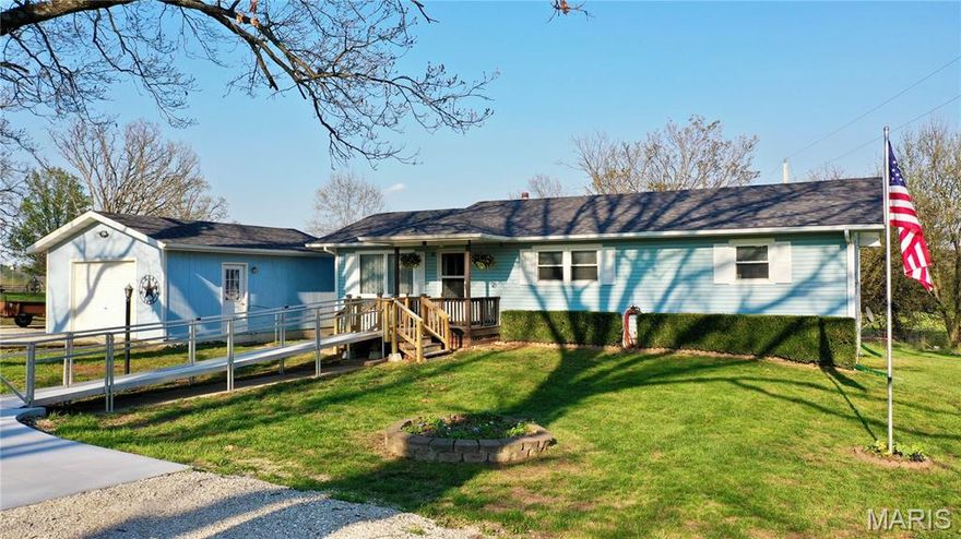 Escape to the perfect blend of comfort, convenience, and country charm with this beautifully maintained 4-bedroom, 1.5-bath home with 1450 finished square feet of living space with room to expand.  This home is situated on a peaceful 1-acre lot just 1 mile from town—close enough for convenience, yet far enough to enjoy the quiet of rural living.  This inviting property sits on a paved road and features a circle driveway with a concrete parking pad, dedicated RV parking area, detached garage/workshop that is insulated and heated, and a large backyard shed —plenty of space for guests, toys, and everyday living. Mature trees and established landscaping provide shade, privacy, and timeless curb appeal.  Step inside to find a warm, functional layout, including a spacious kitchen with a breakfast bar and a cozy country feel—perfect for gathering with family and friends. The updated bathroom features a new floor and vanity, blending modern touches with classic style.  Enjoy outdoor living at its best with a back deck ideal for grilling and relaxing evenings, along with a walkout basement that opens to a concrete patio—perfect for entertaining or unwinding. The stocked pond adds a peaceful, scenic touch and offers a great spot for fishing right in your own backyard.  Major updates include a new roof (2024) and a propane furnace installed in 2020, giving peace of mind for years to come.

If you’re looking for space, privacy, and a move-in-ready home with thoughtful upgrades and outdoor features, this property checks all the boxes.

Schedule your showing today and experience country living just minutes from town!