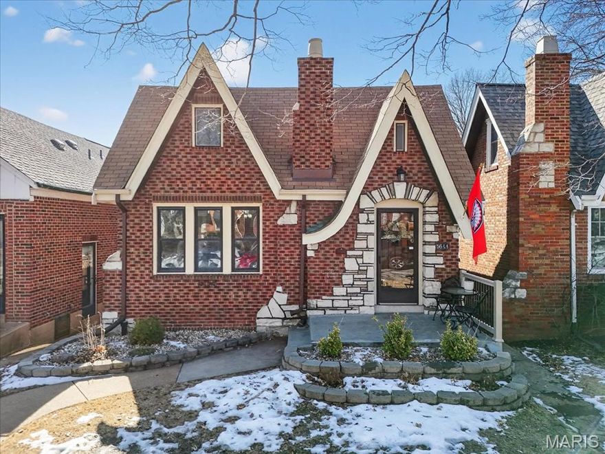 Nestled in the heart of Southampton, this storybook brick Gingerbread home is full of timeless charm and character. Step inside to a welcoming entry foyer framed by stained glass windows and refinished hardwood floors, setting the tone for the classic details found throughout. The spacious living room is flooded with natural light and features a statement stone fireplace, flowing seamlessly into a separate dining room ideal for hosting and entertaining. The bright white kitchen offers ample cabinet space and opens to a sunroom that leads out to the deck, creating an easy connection to outdoor living. The main level includes two bedrooms, a den and a full bathroom. Upstairs, you’ll find two additional bedrooms, one of which can function as a second living area, complete with a nook perfect for a home office or play space. A fenced backyard and detached two-car garage complete this charming home. Set on tree-lined streets with walkable blocks, nearby parks, coffee shops, and beloved South City favorites just minutes away, this home delivers the charm, character, and sense of community Southampton is known for.