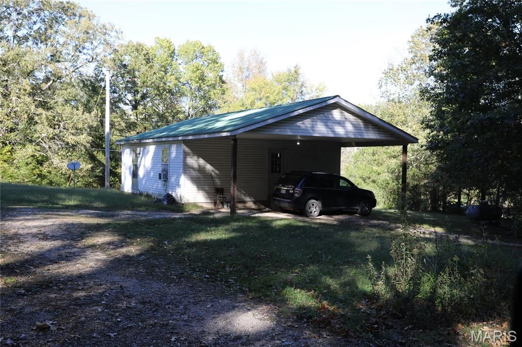 Photo of 3841 County Road 441, Poplar Bluff, MO 63901 (MLS # 25073681)